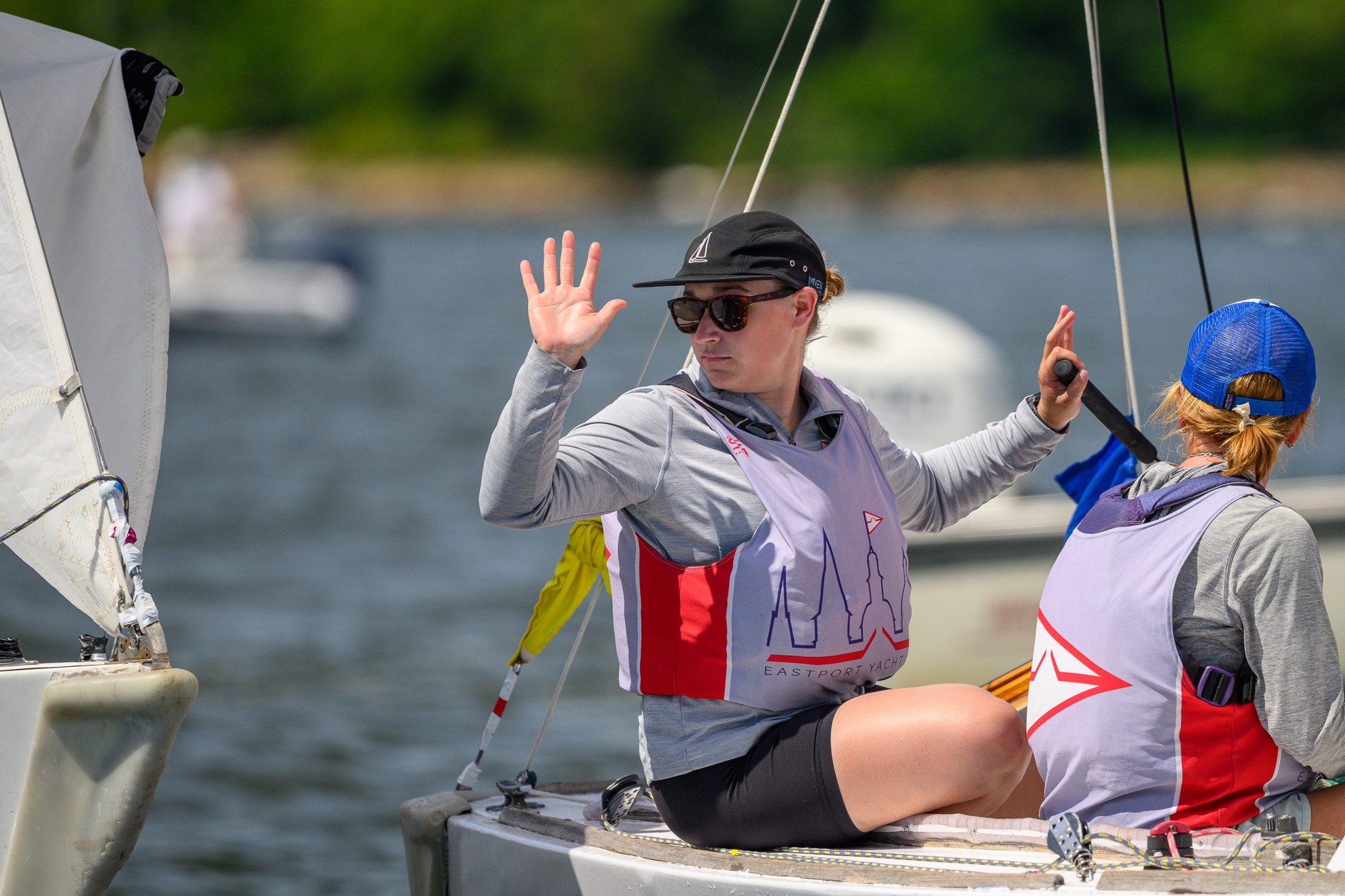 Sailor waving from the boat